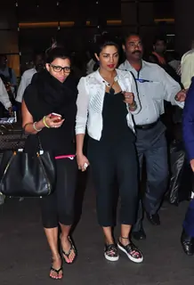 Priyanka Chopra Returns from Vacation - Snapped at Airport