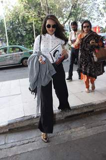 Sonakshi Sinha Snapped With her Father's Book at Airport