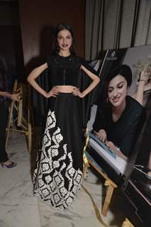 Divya Khosla Kumar Poses with her Poster at Roopa Vohra's Calendar Launch