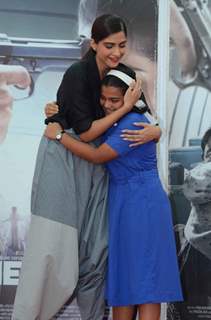 Sonam snapped hugging a young girl at the Promotions of Neerja at Xaviers College