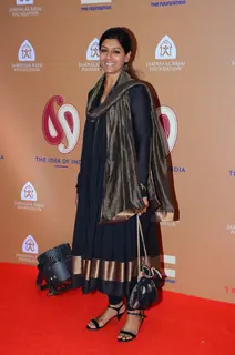Nandita Das poses for the media at the Auction Event hosted by Rahul Bose