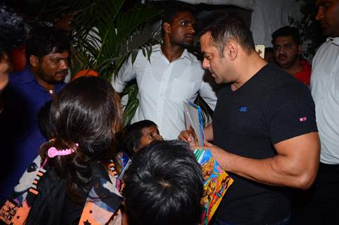 Salman Khan Distributes books to street Kids Outside Olive