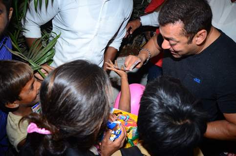 Salman Khan Distributes books to street Kids Outside Olive