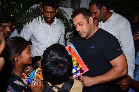 Salman Khan Snapped Distributing books to street Kids Outside Olive