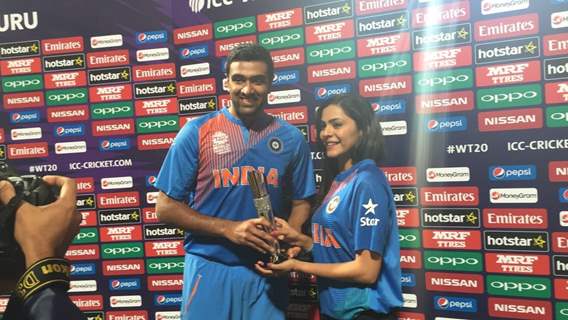 Anuja Sathe Presents an Award to R Ashwini at ICC T20 World Cup