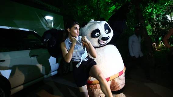 Jacqueline Fernandes poses with Kung Fu Panda's PO