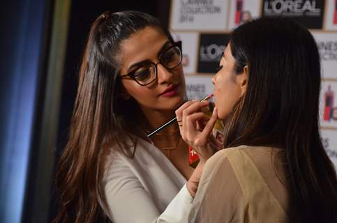 Sonam Kapoor tries her hand as make up artist! - at L'oreal Cannes Collection Launch!