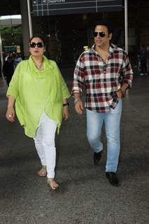 Govinda Snapped with wife Sunita Ahuja at Airport