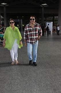 Govinda Snapped with wife Sunita Ahuja at Airport