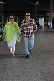 Govinda Snapped with wife Sunita Ahuja at Airport