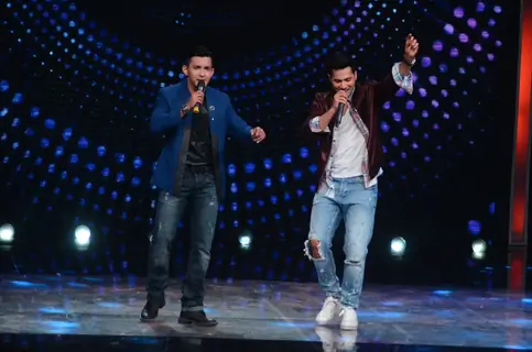 Varun Dhawan with Aditya Narayan during Promotions of 'Dishoom' on Sa Re Ga Ma Pa 2016