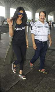 Priyanka Chopra posing on airport
