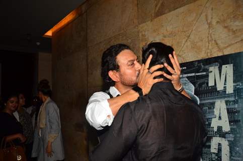Actor Irrfan Khan kisses Ranveer Singh at the special screening of 'Madaari'