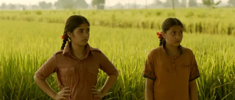 Still of Zaira Wasim and Suhani Bhatnagar from Dangal