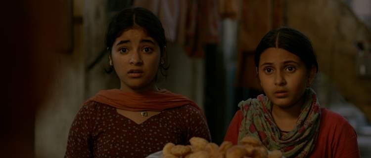 Still of Zaira Wasim and Suhani Bhatnagar from Dangal