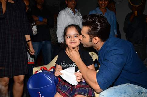 Varun Dhawan poses with a fan at Mehboob Studio