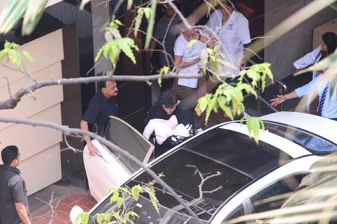 Karan Johar taking his babies home from hospital