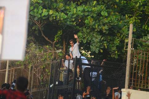 Shah Rukh Khan waves at his fans