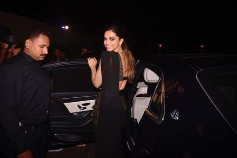 Deepika poses while leaving the event