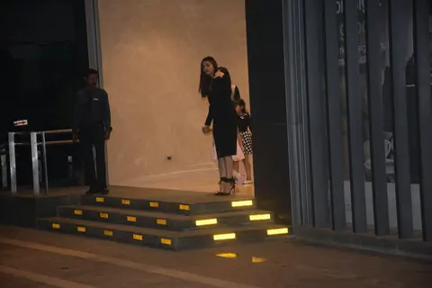 Aishwarya, Abhishek with Aaradhya outside an eatery