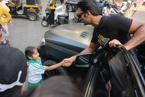 Singh greets a little fan!