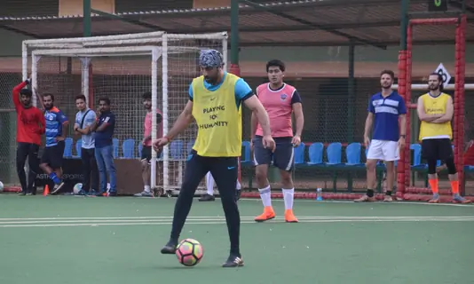 Ranbir, Dino and Jim indulge in a game of Football