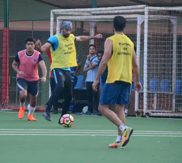 Ranbir, Dino and Jim indulge in a game of Football
