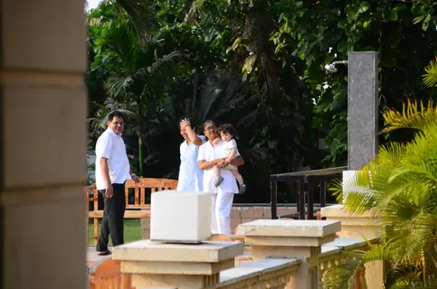Taimur Ali Khan walking by the poolside