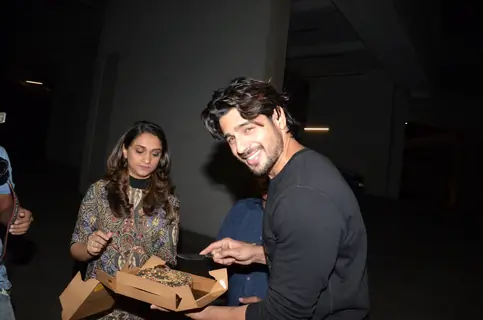 Sidharth Malhotra cutting cake at his birthday bash