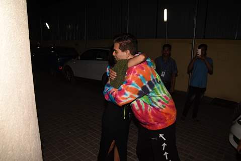 Karan Johar greets friend at the screening