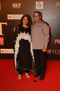 Ramesh Taurani and his wife attend the special screening of Bharat