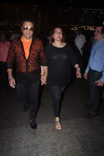 Govinda snapped with wife on the airport