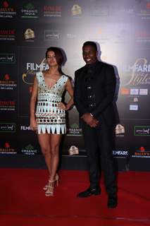 Shakti Mohan and Dwayne Bravo papped at the Red Carpet of Filmfare Glamour and Style Awards 2019