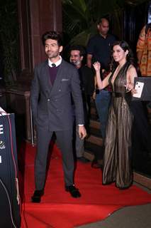 Divya Khosla Kumar and Kartik Aaryan papped at the Red Carpet of Filmfare Glamour and Style Awards 2019