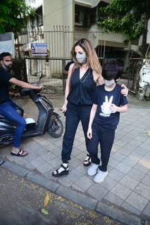 Sussanne Khan snapped with her son at Kromakay salon in Juhu