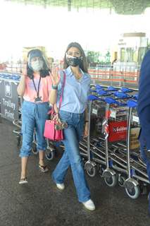 Riddhima Kapoor Sahani snapped departing with her daughter from Mumbai airport