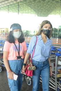 Riddhima Kapoor Sahani snapped departing with her daughter from Mumbai airport