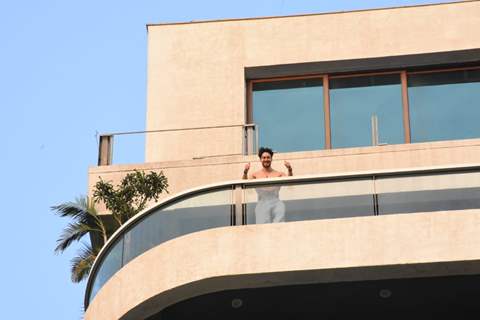 Tiger Shroff snapped flexing muscles in his balcony