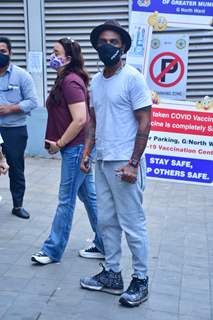 Remo D'Souza with wife Lizelle D'Souza spotted at Dadar vaccination centre