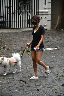 Malaika Arora snapped this morning taking her dog for a walk