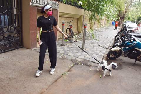 Khushi Kapoor snapped walking her dog this evening