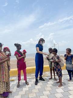 Urvashi Rautela distributes food amongst the needy affected by the cyclone Tauktae