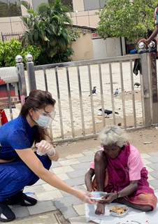 Urvashi Rautela distributes food amongst the needy affected by the cyclone Tauktae