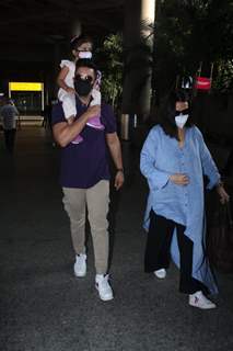 Neha Dhupia and Angad Bedi snapped arriving at Mumbai airport on Monday