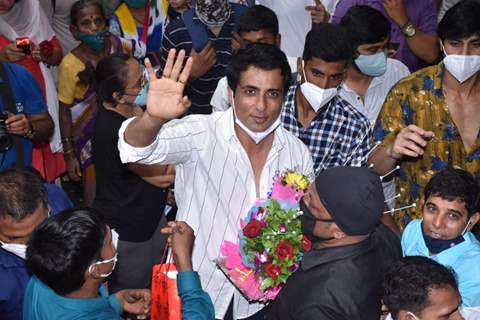 Sonu Sood greets his fans as they gather to celebrate his birthday