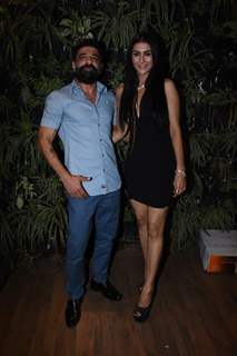 Eijaz Khan poses with his girlfriend Pavitra Punia for an event in the city
