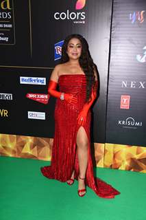 Neha Kakkar poses on the green carpet of IIFA awards 2022