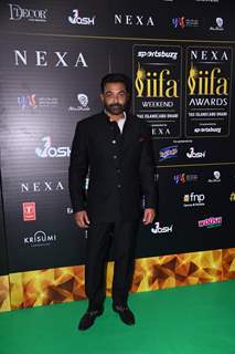 Bobby Deol poses on the green carpet of IIFA awards 2022 