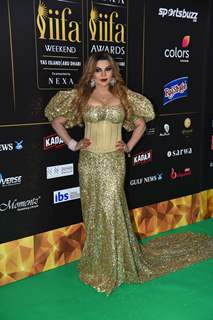 Rakhi Sawant poses to paparazzi at green carpet of IIFA awards 2022 in Abu Dhabi