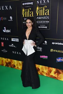 Amruta Khanvilkar poses to paparazzi at green carpet of IIFA awards 2022 in Abu Dhabi